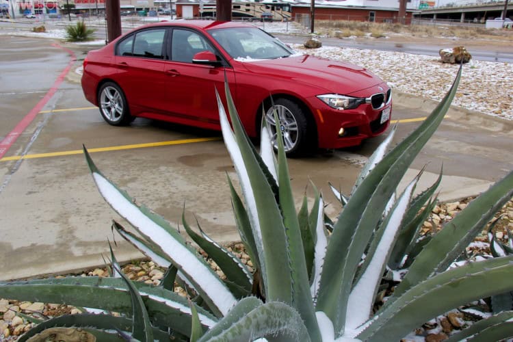 Front three-quarter view of 2014 BMW 328d M Sport Sedan during road trip test drive