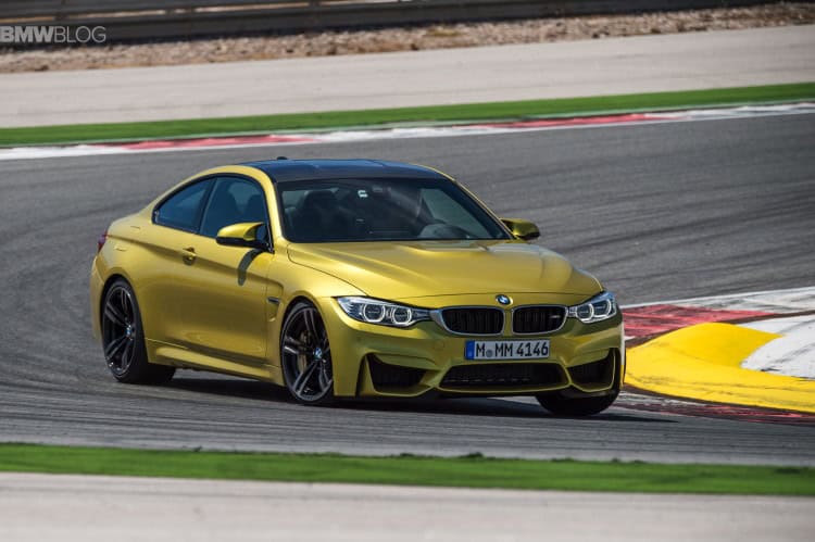 2015 BMW M4 in Austin Yellow on the track