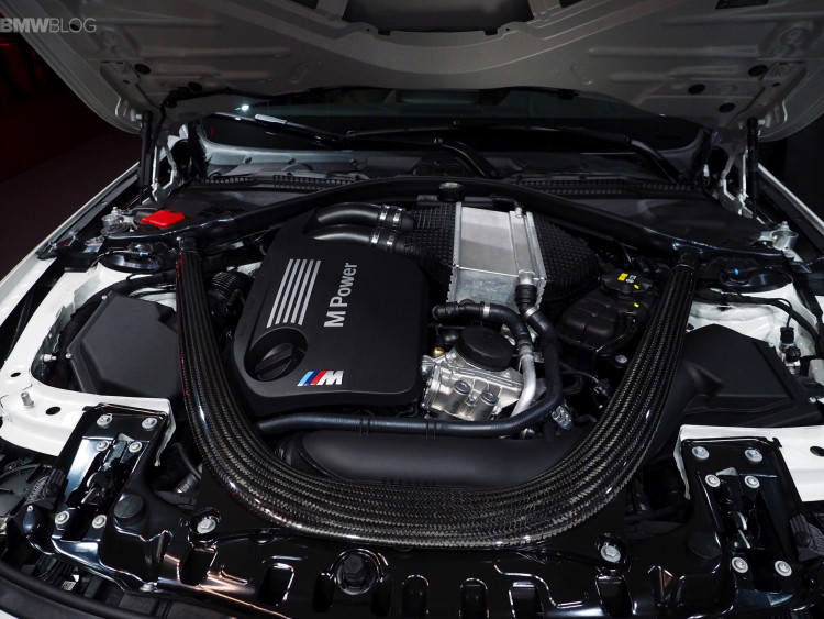 A Frozen Brilliant White BMW M3, referencing the modified cooling parts used in a PC setup