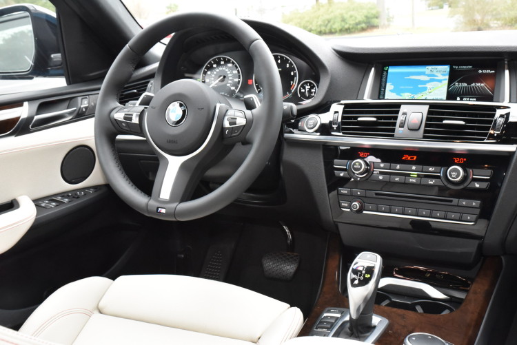 2016-BMW-X4-M40i-Long-Beach-Blue-drive-8