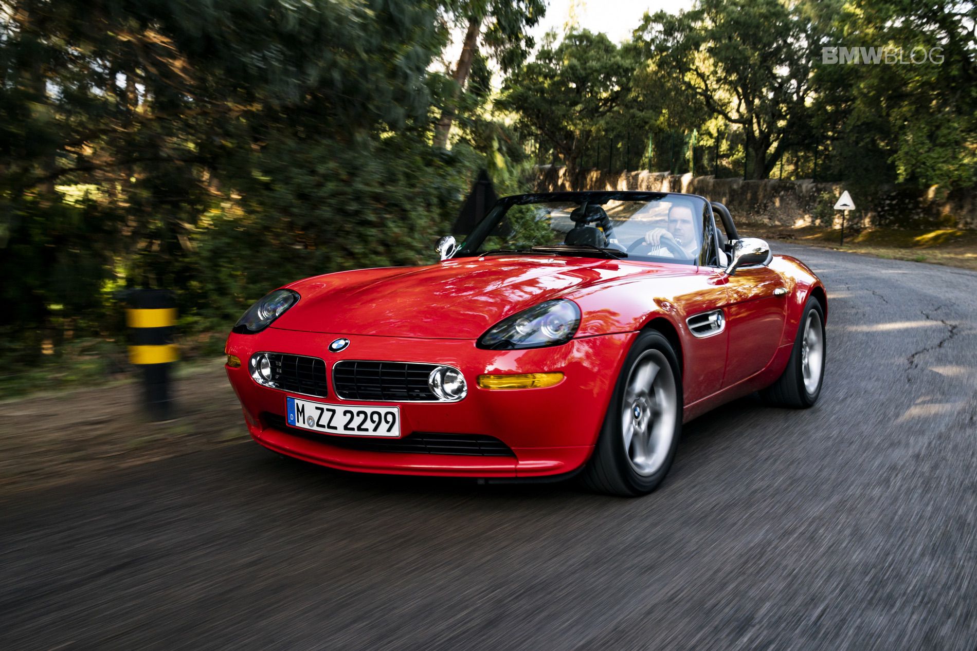 Driving the BMW Z8 Roadster in a red color