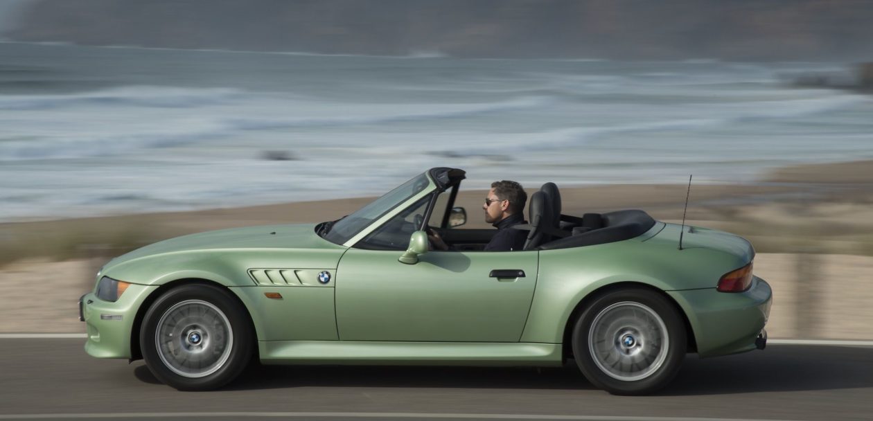 BMW Z3 Roadster in Palmetto Green driving by the ocean
