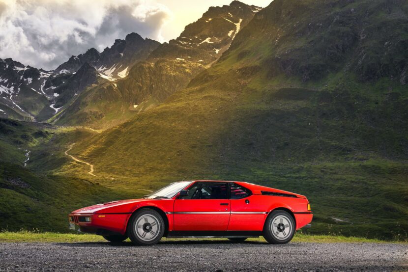 Side view BMW M1 against the Alps backdrop