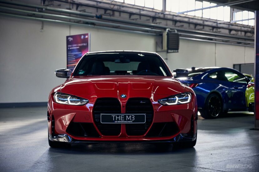 BMW M3 in Toronto Red and featuring carbon fiber accessories