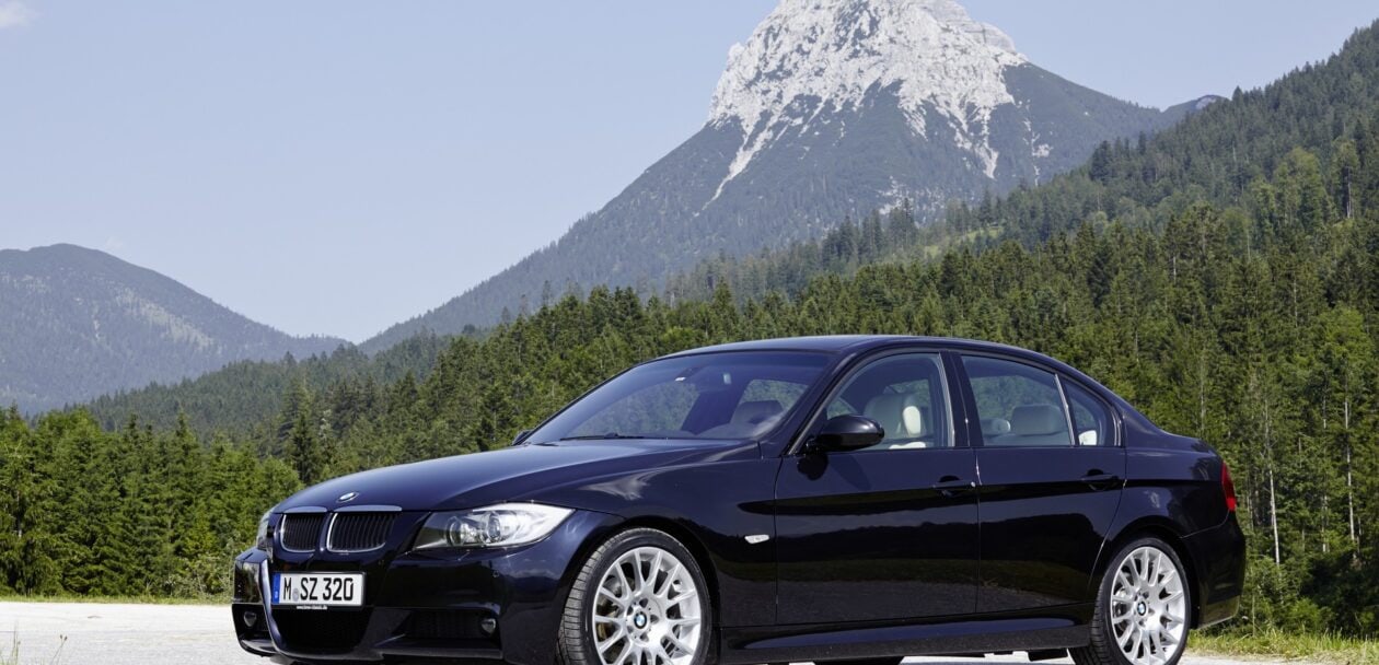 E90 BMW 335i side view parked car