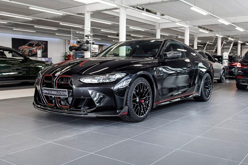 BMW M4 CSL Sapphire Black Revs Engine In Dealer Showroom Next To M3 CSL