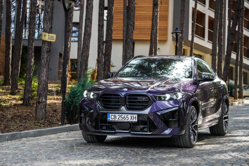 2024 BMW X6 M Competition Techno Violet-62 2024 BMW X6 M Competition in Techno Violet rear three-quarter view