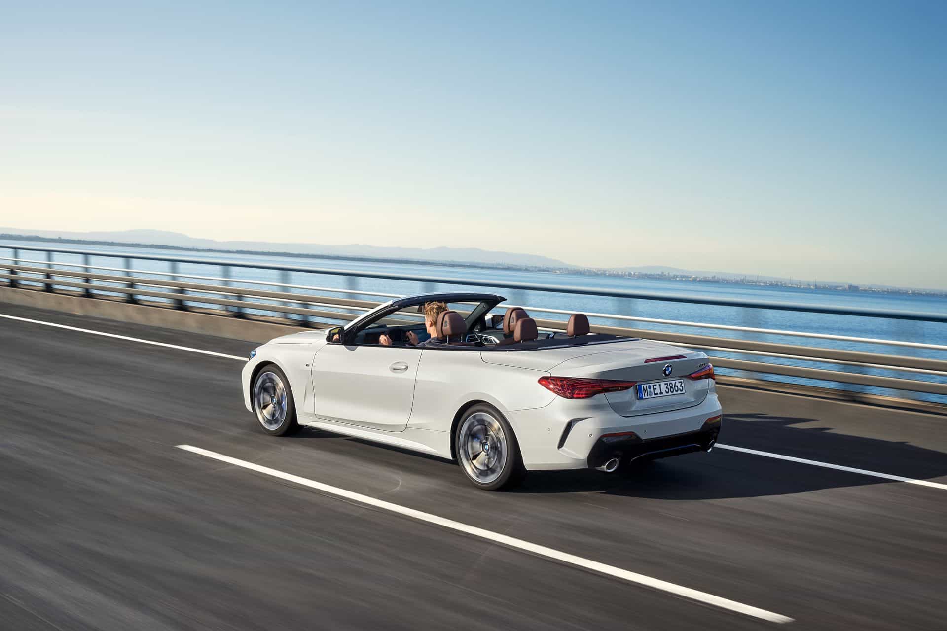 BMW 4 Series Convertible driving on the road