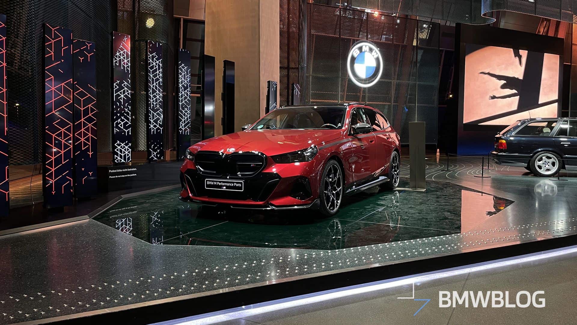 BMW i5 M60 Touring in Fire Red
