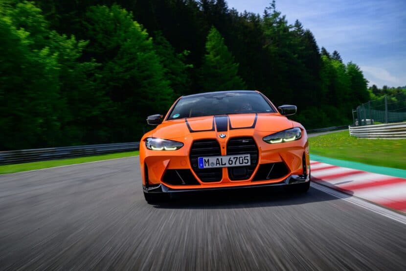 2025 BMW M4 on the track in Fire Orange