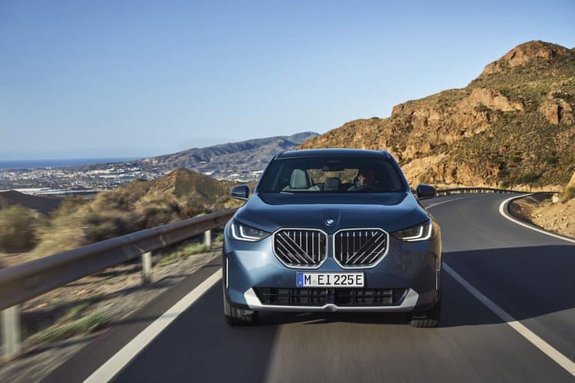 BMW X3 driving on the road