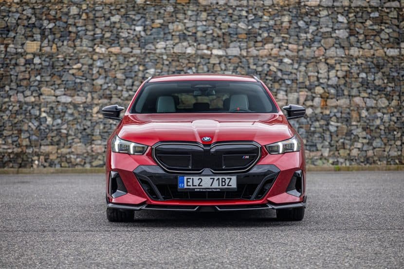 BMW i5 Touring in Fire Red