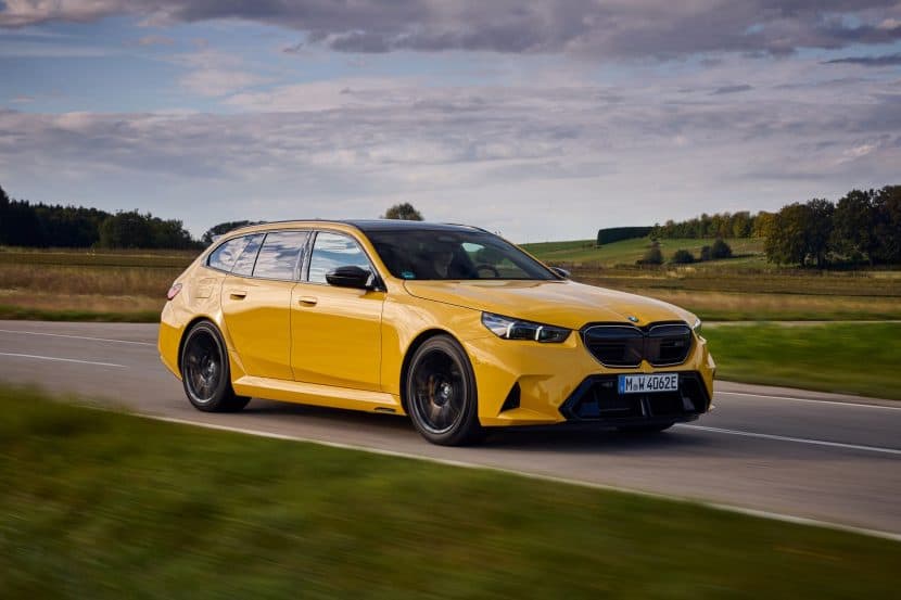 2025 BMW M5 Touring Speed Yellow driving on backroads