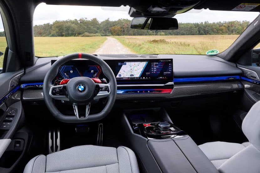The interior cabin and steering wheel of the BMW M5 Touring