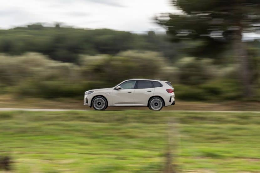 2025 BMW X3 30e xDrive driving on the road