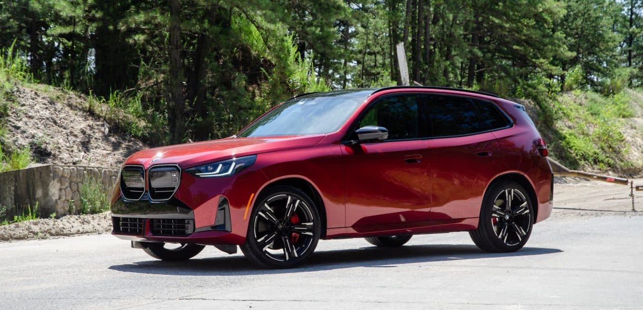 2025 BMW X3 M50 FIRE RED side view