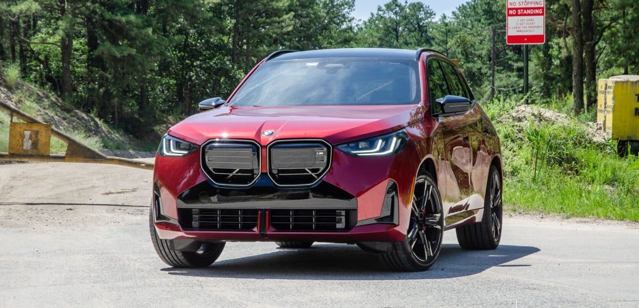 2025 BMW X3 M50 in Vegas Red Metallic front three-quarter view during road test