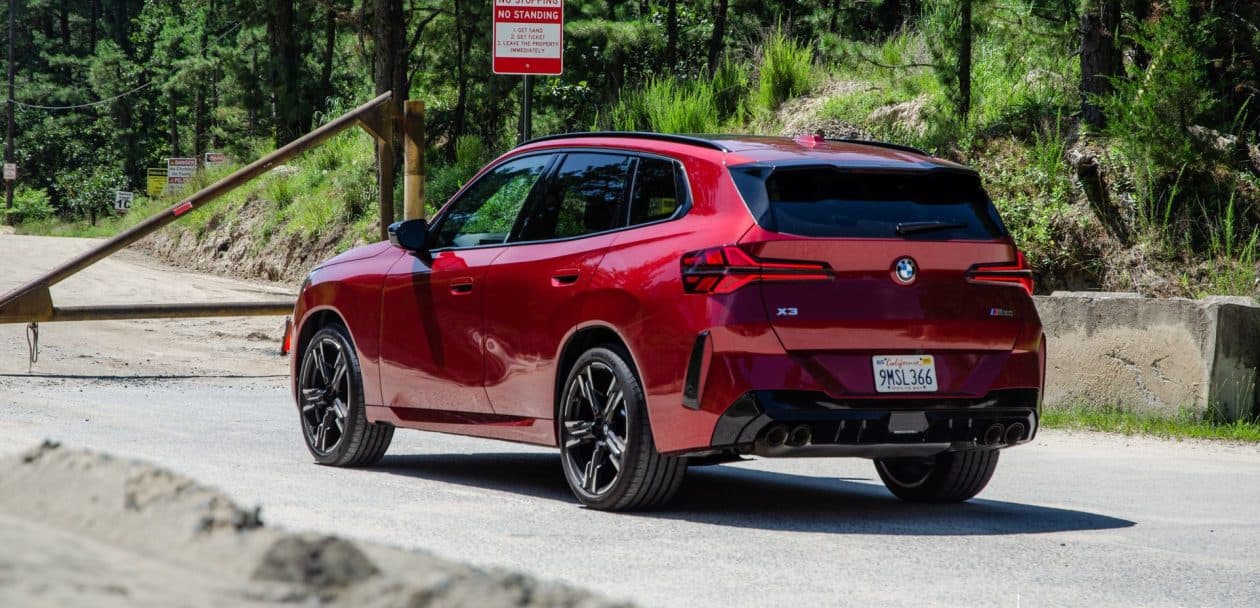 2025 BMW X3 M50 FIRE RED three quarter rear-end