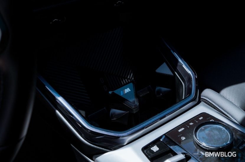 Interior of 2025 BMW X3 M50 showing V-shaped light bar and center console design