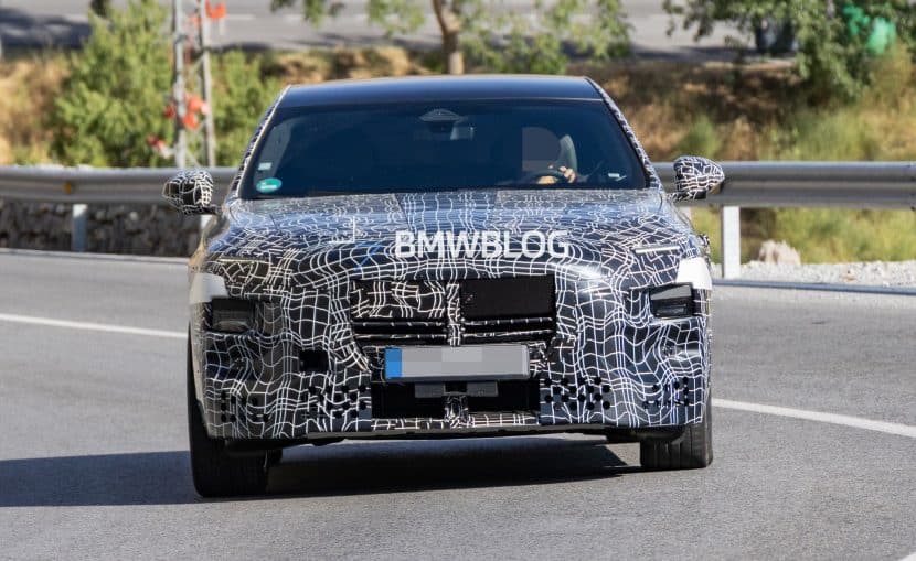 2027 BMW 7 SERIES FACELIFT SPY PHOTOS 17 2027 BMW 7 Series facelift prototype showing split headlights and camouflaged front bumper during testing