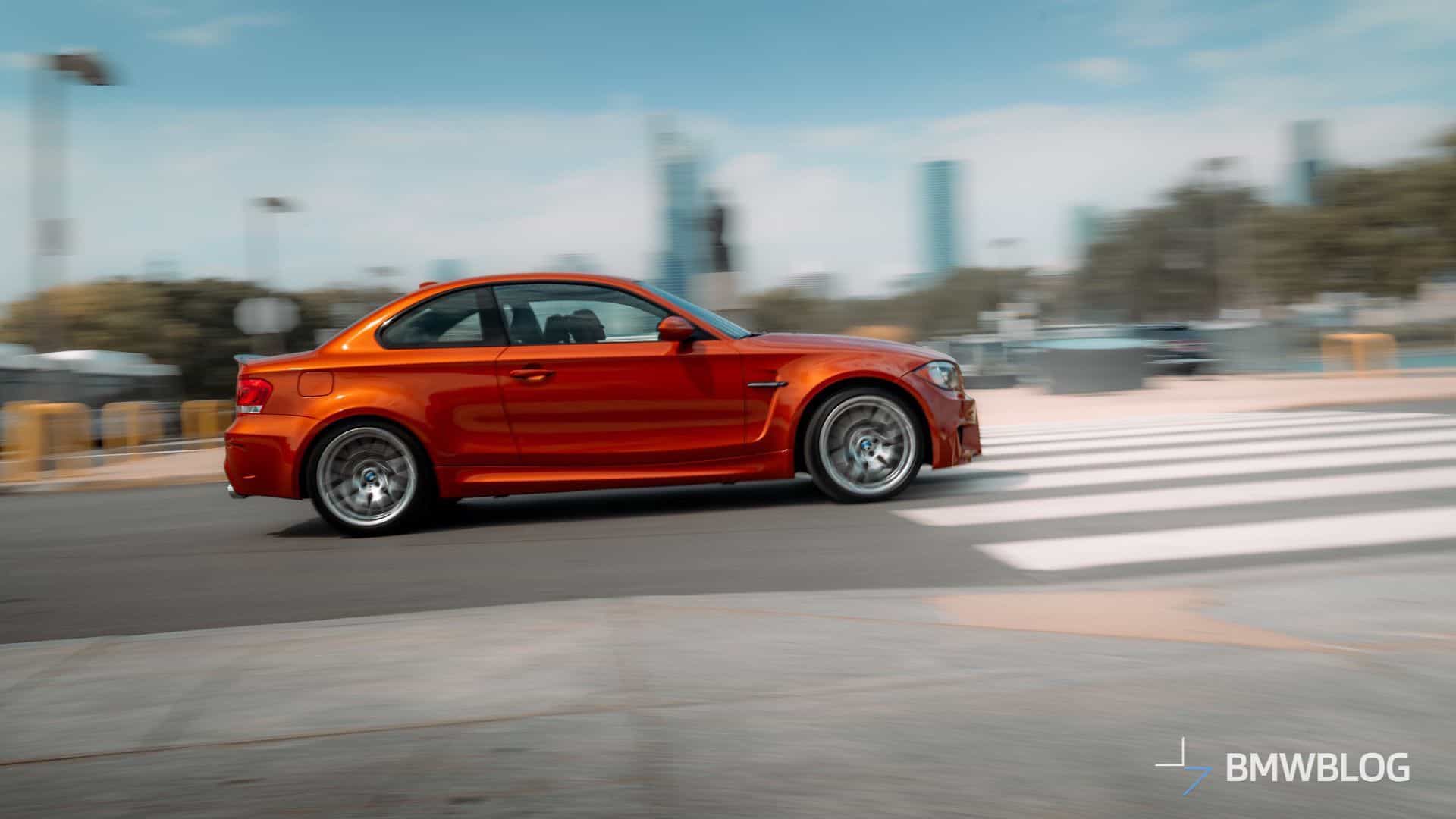 BMW 1M IN VALENCIA ORANGE SIDE VIEW