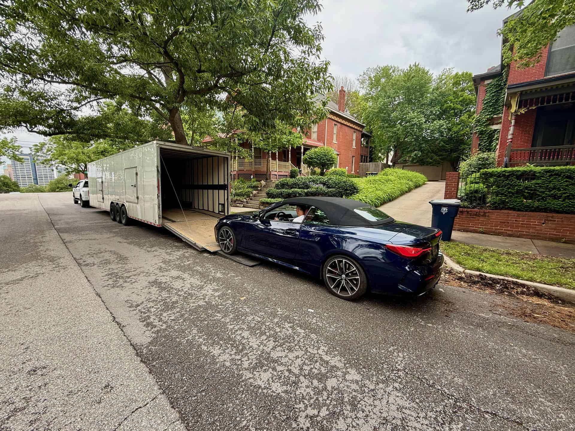 BMW M440I XDRIVE CONVERTIBLE loading in the truck