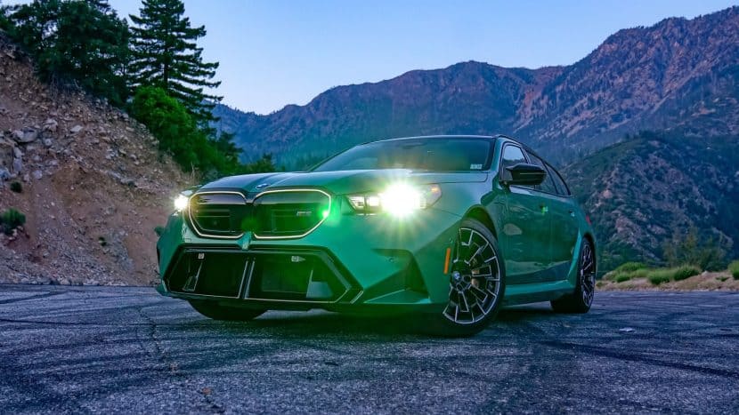 2025 BMW M5 TOURING with the lights on