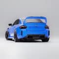 Sporty blue BMW M2 car with aerodynamic features and racing tires
