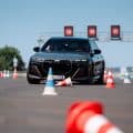 BMW PROTECTION VEHICLES TRAINING doing cones avoidance and maneuvers on the track
