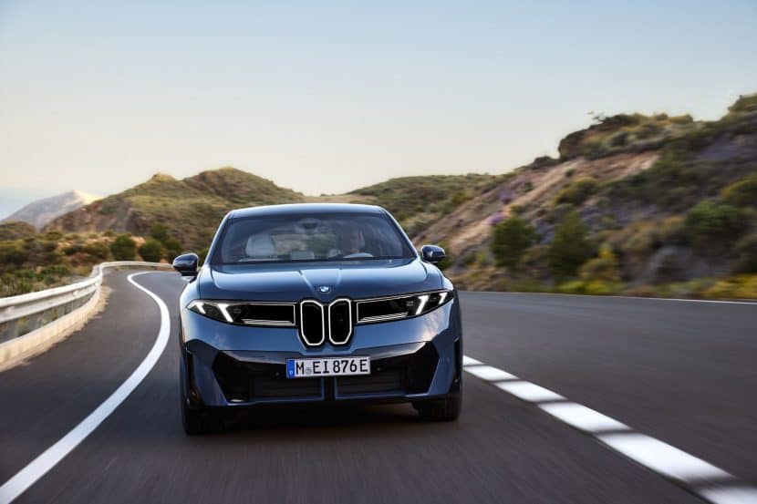 2026 BMW IX3 driving on the road
