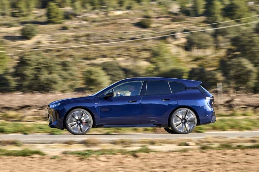 2026 BMW IX M70 TEST DRIVE REVIEW 02 2026 BMW IX M70 TEST DRIVE REVIEW side view on the road