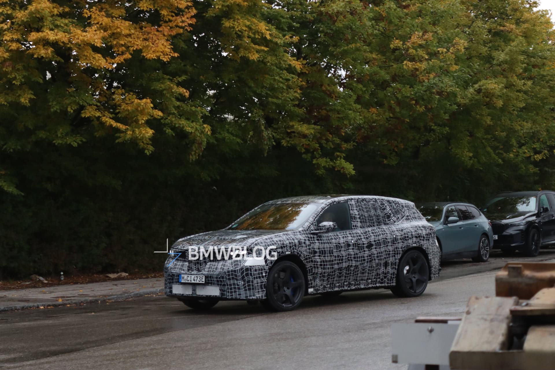 BMW X3 M Electric prototype testing in camouflage