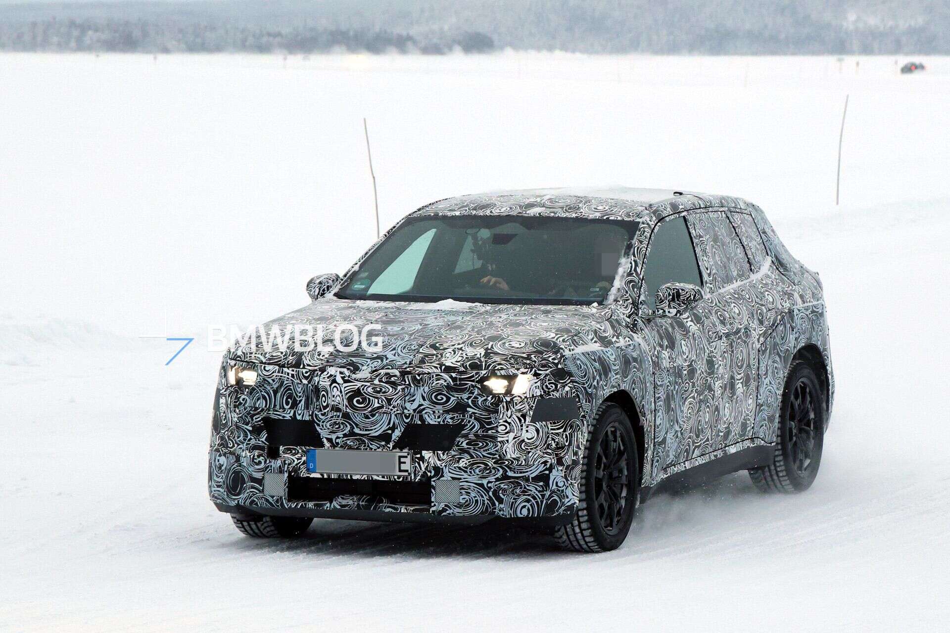 2028 BMW IX1 NB5 SPY PHOTOS driving in the snow