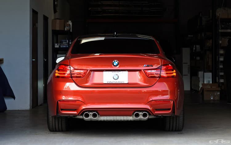 Sakhir Orange BMW F82 M4 In For Some Modifications At EAS